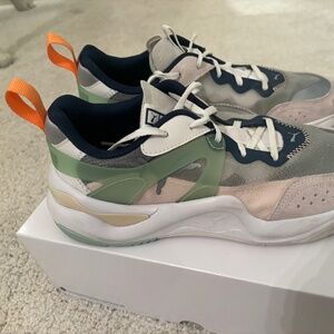 Fun navy, teal, and orange Puma sneakers